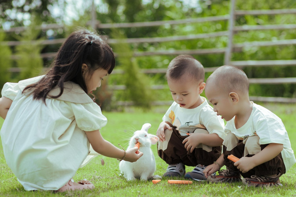 children singing outdoors nature